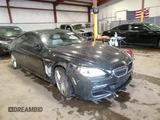 2015 BMW 6 Series 640i xDrive z VIN WBA6B8C58FD453159, wystawiony jako Copart lot #88931285 z przebiegiem 145 656 mil mil oraz Szkoda całkowita • Salvage title. Historia ofert i sprzedaży dostępna na DreamBid. Obrazek 13.