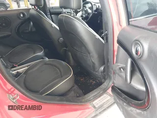 2012 MINI Countryman S with VIN WMWZC5C51CWL56989, listed as a IAAI auction lot 42195253 with 105,750 mi miles and . Bid and sale history available at DreamBid. Image 8.