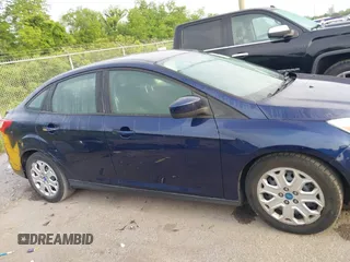 2012 Ford Focus SE z VIN 1FAHP3F24CL102600, wystawiony jako IAAI lot #42169855 z przebiegiem 91 905 mil mil oraz . Historia ofert i sprzedaży dostępna na DreamBid. Obrazek 13.