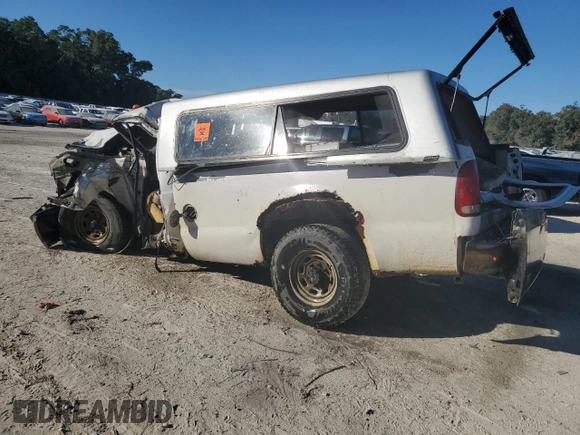 2001 Ford F-350 with VIN 1FTSF30S61EB66117, listed as a Copart auction lot 80763424 with 254,489 mi miles and Non repairable. Bid and sale history available at DreamBid. Image 2.