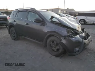 2015 Toyota RAV4 LE with VIN 2T3BFREV3FW305626, listed as a Copart auction lot 88966985 with 128,913 mi miles and Salvage Title. Bid and sale history available at carsss.com. Image 4.