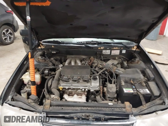 1998 Toyota Avalon XL with VIN 4T1BF18B5WU229340, listed as a IAAI auction lot 41957632 with 212,657 mi miles and . Bid and sale history available at DreamBid. Image 10.
