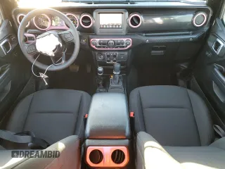 2023 Jeep Wrangler Sport S with VIN 1C4HJXDG5PW615926, listed as a Copart auction lot 84765684 with 23,333 mi miles and Salvage Title. Bid and sale history available at DreamBid. Image 8.