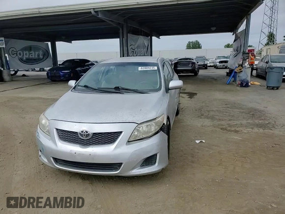 2010 Toyota Corolla with VIN 1NXBU4EE8AZ187793, listed as a Copart auction lot 63909235 with 65,164 mi miles and Salvage title. Bid and sale history available at DreamBid. Image 13.