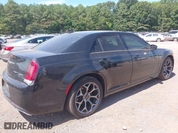 2015 Chrysler 300 with VIN 2C3CCABG1FH807740, listed as a IAAI auction lot 40246268 with 174,037 mi miles. Bid and sale history available at carsss.com. Image 4.