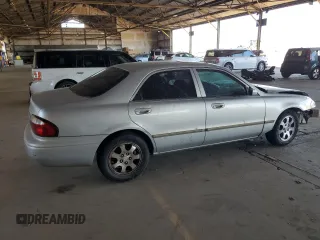 2002 Mazda 626 LX with VIN 1YVGF22C425273491, listed as a Copart auction lot 44626465 with 147,591 mi miles and Salvage Title. Bid and sale history available at carsss.com. Image 3.