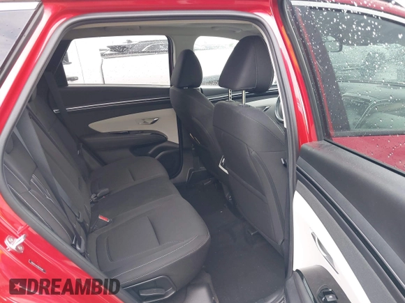 2022 Hyundai Tucson SEL with VIN 5NMJF3AE2NH115088, listed as a IAAI auction lot 41915800 with 13,120 mi miles and . Bid and sale history available at DreamBid. Image 8.