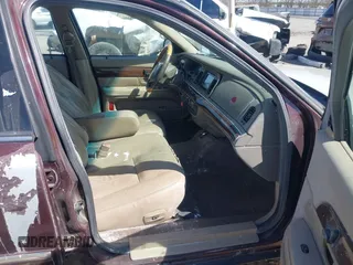 2003 Mercury Grand Marquis LS Premium z VIN 2MEFM75W73X650193, wystawiony jako IAAI lot #41803310 z przebiegiem 151 719 mil mil oraz . Historia ofert i sprzedaży dostępna na DreamBid. Obrazek 5.