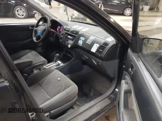 2004 Honda Civic LX with VIN 2HGES165X4H517818, listed as a IAAI auction lot 42164416 with 164,918 mi miles and . Bid and sale history available at carsss.com. Image 5.