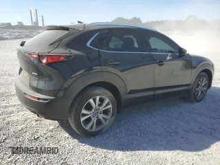 2020 Mazda CX-30 Premium with VIN 3MVDMAEM4LM137806, listed as a Copart auction lot 76620304 with 65,071 mi miles and Salvage title. Bid and sale history available at DreamBid. Image 3.