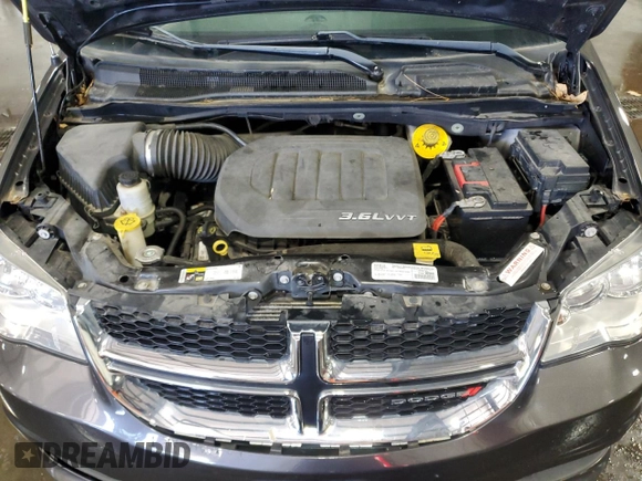 2016 Dodge Grand Caravan SXT with VIN 2C4RDGCG6GR273330, listed as a Copart auction lot 55937635 with 106,688 mi miles and Clean Title. Bid and sale history available at DreamBid. Image 12.
