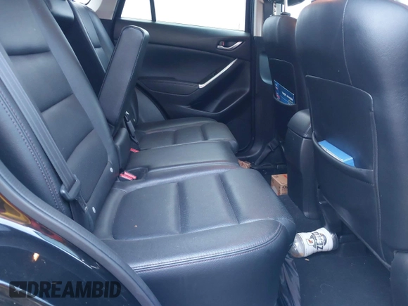 2016 Mazda CX-5 Grand Touring z VIN JM3KE4DY9G0605489, wystawiony jako IAAI lot #42085160 z przebiegiem 160 338 mil mil oraz . Historia ofert i sprzedaży dostępna na DreamBid. Obrazek 8.