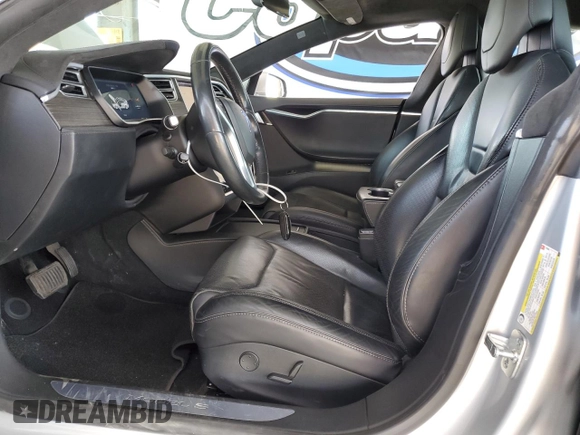 2016 Tesla Model S 90D with VIN 5YJSA1E24GF178298, listed as a Copart auction lot 52799545 with 112,391 mi miles and Salvage Title. Bid and sale history available at DreamBid. Image 7.