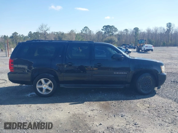 2011 Chevrolet Suburban LT with VIN 1GNSCJE06BR402433, listed as a IAAI auction lot 41819335 with 203,335 mi miles. Bid and sale history available at carsss.com. Image 13.