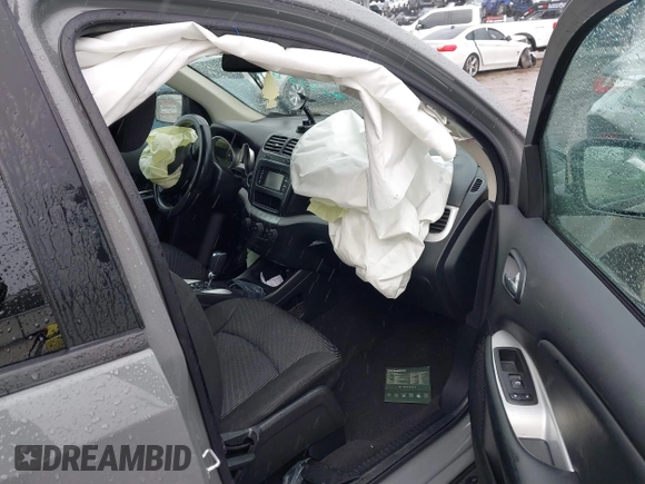 2019 Dodge Journey SE with VIN 3C4PDCBB2KT804440, listed as a IAAI auction lot 41333876 with 72,209 mi miles and . Bid and sale history available at DreamBid. Image 5.
