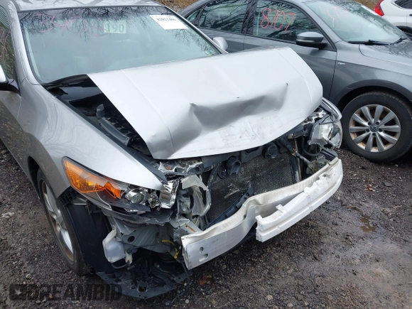 2010 Acura TSX with VIN JH4CU2F64AC031288, listed as a IAAI auction lot 42023406 with 144,192 mi miles. Bid and sale history available at carsss.com. Image 6.