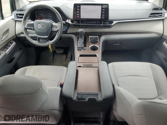 2021 Toyota Sienna LE with VIN 5TDBSKFC4MS027897, listed as a Copart auction lot 56052375 with 66,604 mi miles and Salvage title. Bid and sale history available at DreamBid. Image 8.