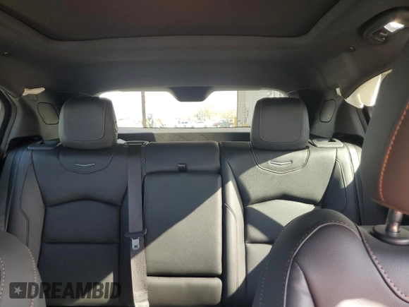 2021 Cadillac XT4 FWD Sport with VIN 1GYFZER44MF080872, listed as a Copart auction lot 86344534 with 23,865 mi miles and Salvage Title. Bid and sale history available at DreamBid. Image 10.