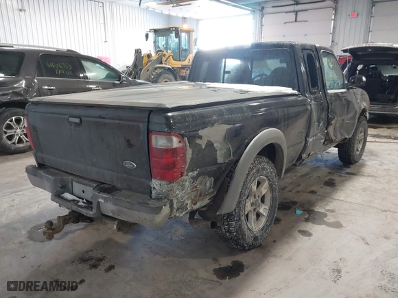 2003 Ford Ranger XL Fleet with VIN 1FTZR45EX3PA60520, listed as a IAAI auction lot 41591797 with 205,040 mi miles. Bid and sale history available at carsss.com. Image 4.