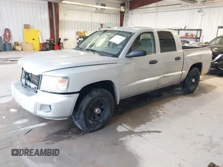 2008 Dodge Dakota SLT with VIN 1D7HW48N18S562245, listed as a IAAI auction lot 40939208 with 230,571 mi miles and . Bid and sale history available at DreamBid. Image 2.