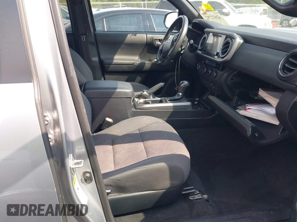 2017 Toyota Tacoma SR5 with VIN 5TFAZ5CN3HX042874, listed as a IAAI auction lot 42022752 with 104,013 mi miles and . Bid and sale history available at carsss.com. Image 5.
