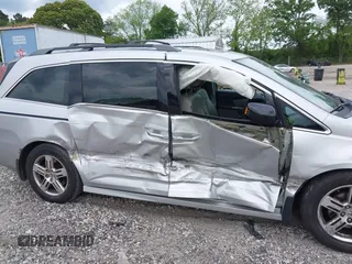 2012 Honda Odyssey Touring с VIN 5FNRL5H90CB083157, выставлен на аукционе IAAI как лот 42176609 с пробегом 250 000 миль миль и . История ставок и продаж доступна на DreamBid. Изображение 6.