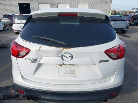 2015 Mazda CX-5 Grand Touring with VIN JM3KE4DY3F0483629, listed as a IAAI auction lot 41054059 with 118,980 mi miles. Bid and sale history available at carsss.com. Image 15.