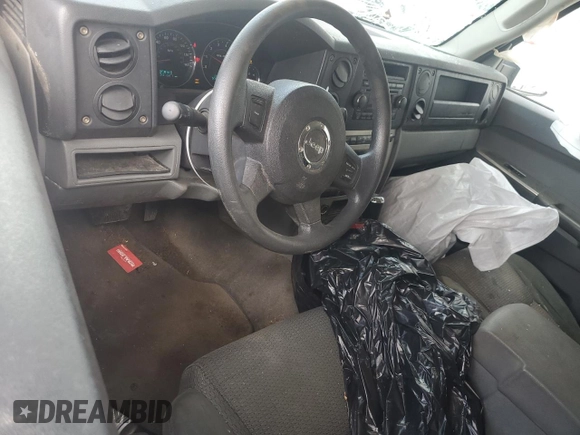 2007 Jeep Commander Sport z VIN 1J8HG48K47C691109, wystawiony jako Copart lot #52138775 z przebiegiem 231 327 mil mil oraz Szkoda całkowita • Salvage title. Historia ofert i sprzedaży dostępna na DreamBid. Obrazek 8.