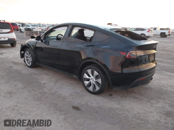 2023 Tesla Model Y Long Range z VIN 7SAYGDEE2PA166042, wystawiony jako IAAI lot #41348960 z przebiegiem Nie podano mil oraz . Historia ofert i sprzedaży dostępna na DreamBid. Obrazek 3.