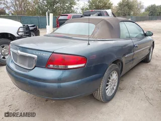 2002 Chrysler Sebring Limited with VIN 1C3EL65R72N201668, listed as a IAAI auction lot 41018612 with 143,931 mi miles. Bid and sale history available at carsss.com. Image 4.