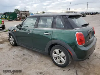 2017 MINI Hardtop 4 Door Cooper with VIN WMWXU1C57H2E18281, listed as a Copart auction lot 69714554 with 77,049 mi miles and Salvage Title. Bid and sale history available at carsss.com. Image 2.