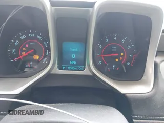 2014 Chevrolet Camaro LS z VIN 2G1FA1E32E9147104, wystawiony jako IAAI lot #42324064 z przebiegiem 70 585 mil mil oraz . Historia ofert i sprzedaży dostępna na DreamBid. Obrazek 7.