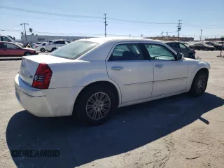 2010 Chrysler 300 Touring with VIN 2C3CA5CV9AH160961, listed as a Copart auction lot 68814424 with 221,248 mi miles and Salvage Title. Bid and sale history available at carsss.com. Image 3.