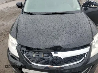 2012 Mazda CX-9 Grand Touring z VIN JM3TB3DA7C0364861, wystawiony jako Copart lot #60199255 z przebiegiem 153 477 mil mil oraz Szkoda całkowita • Salvage title. Historia ofert i sprzedaży dostępna na DreamBid. Obrazek 12.
