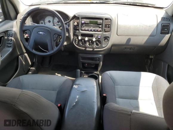 2004 Ford Escape XLS with VIN 1FMCU92114DA15564, listed as a Copart auction lot 59358015 with 186,135 mi miles and Salvage title. Bid and sale history available at DreamBid. Image 8.