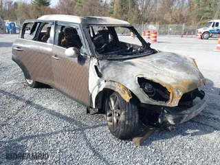 2013 MINI Cooper Countryman with VIN WMWZB3C59DWM31642, listed as a IAAI auction lot 40794983 with 1 mi miles. Bid and sale history available at carsss.com. Image 1.