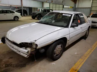 1995 Chevrolet Lumina with VIN 2G1WL52M7S1102989, listed as a Copart auction lot 62636134 with Not Provided miles and Salvage Title. Bid and sale history available at DreamBid. Image 1.