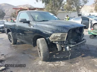 2012 Ram 1500 Express with VIN 3C6JD7AT0CG239839, listed as a IAAI auction lot 41468268 with 146,709 mi miles. Bid and sale history available at carsss.com. Image 1.