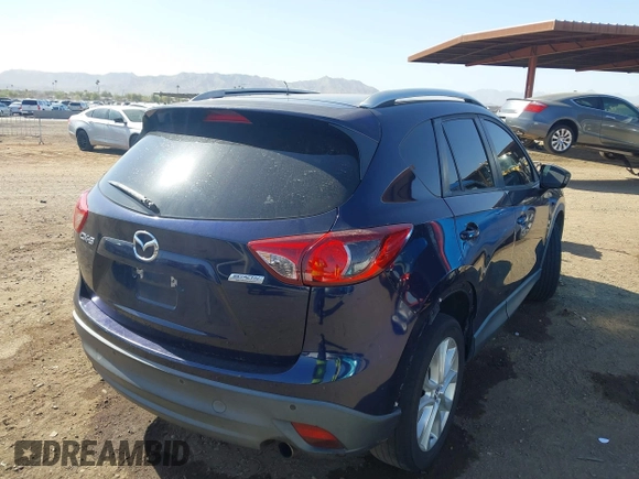 2014 Mazda CX-5 Grand Touring with VIN JM3KE2DY2E0349343, listed as a IAAI auction lot 41725214 with 271,094 mi miles. Bid and sale history available at carsss.com. Image 4.