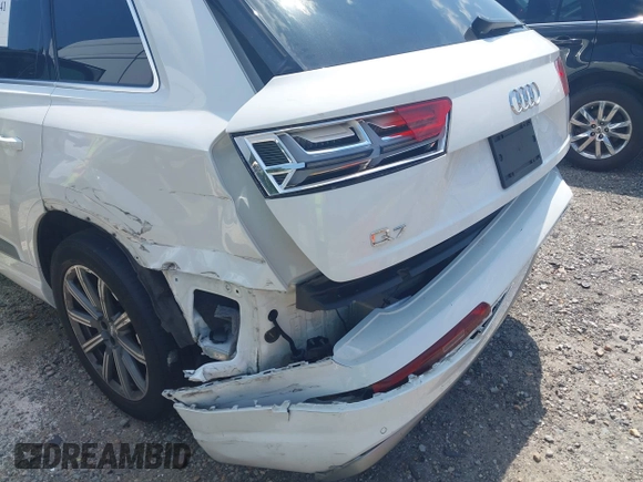 2019 Audi Q7 Premium Plus with VIN WA1LAAF70KD024096, listed as a IAAI auction lot 42564341 with 100,036 mi miles and . Bid and sale history available at DreamBid. Image 6.