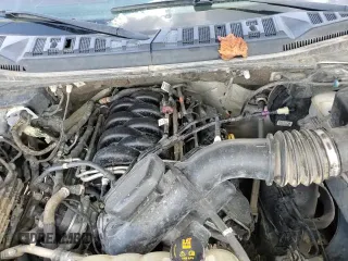 2020 Ford F-150 XL with VIN 1FTEW1E55LFA60517, listed as a Copart auction lot 68031525 with 148,577 mi miles and Salvage title. Bid and sale history available at DreamBid. Image 15.