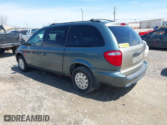 2005 Chrysler Town & Country LX with VIN 2C4GP44R75R267644, listed as a IAAI auction lot 42122611 with 107,802 mi miles and . Bid and sale history available at DreamBid. Image 3.