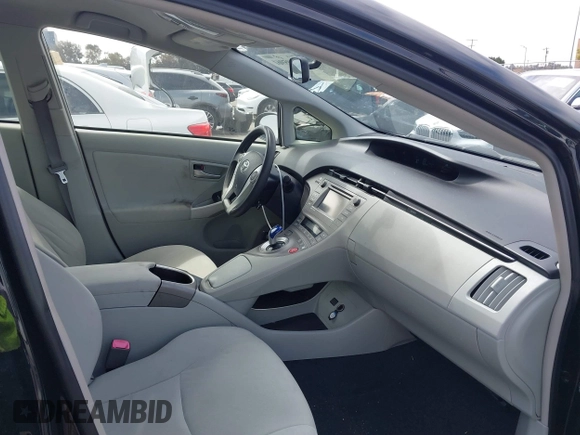 2012 Toyota Prius One z VIN JTDKN3DU2C5495575, wystawiony jako IAAI lot #41905961 z przebiegiem 97 186 mil mil oraz . Historia ofert i sprzedaży dostępna na DreamBid. Obrazek 5.