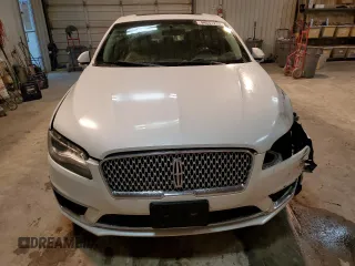 2018 Lincoln MKZ Select z VIN 3LN6L5C99JR621212, wystawiony jako Copart lot #44551225 z przebiegiem 121 303 mil mil oraz Szkoda całkowita • Salvage title. Historia ofert i sprzedaży dostępna na DreamBid. Obrazek 5.