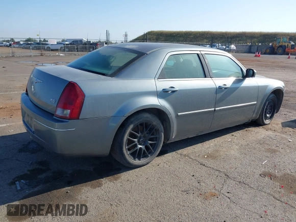 2006 Chrysler 300 Touring with VIN 2C3LA53G66H170047, listed as a IAAI auction lot 42135663 with 215,285 mi miles. Bid and sale history available at carsss.com. Image 4.