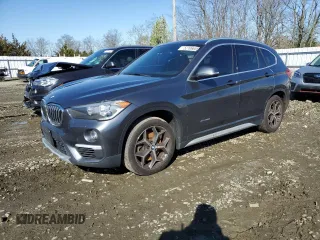 2018 BMW X1 xDrive28i with VIN WBXHT3C30J5K27472, listed as a Copart auction lot 52106655 with 120,936 mi miles and Clean Title. Bid and sale history available at carsss.com. Image 1.