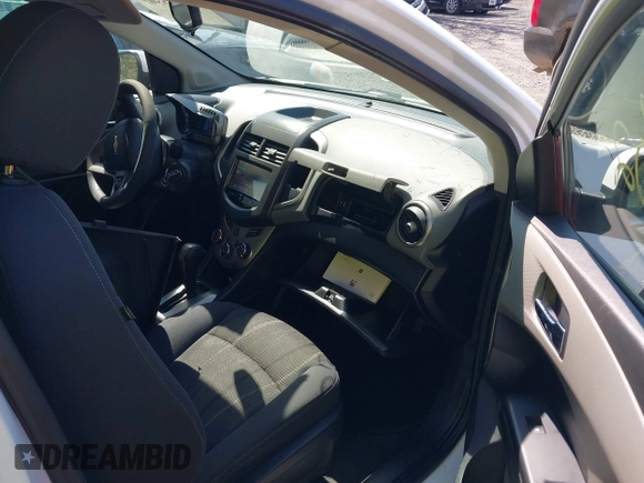 2016 Chevrolet Sonic LT with VIN 1G1JC6SH2G4134831, listed as a IAAI auction lot 41983302 with 85,828 mi miles. Bid and sale history available at carsss.com. Image 5.