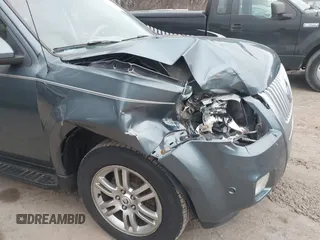 2010 Mercury Mariner Premier with VIN 4M2CN9H75AKJ06979, listed as a IAAI auction lot 41156374 with 149,784 mi miles and . Bid and sale history available at DreamBid. Image 12.