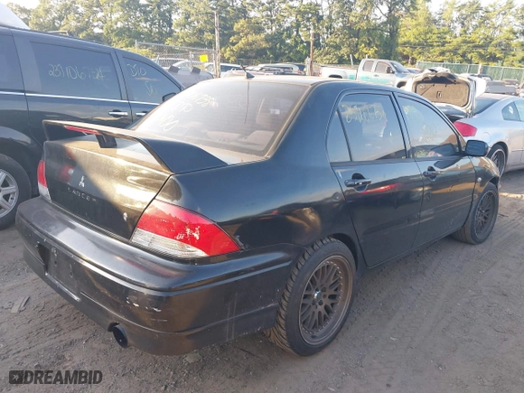2003 Mitsubishi Lancer ES with VIN JA3AJ26EX3U015276, listed as a IAAI auction lot 37806582 with 181,069 mi miles. Bid and sale history available at carsss.com. Image 4.