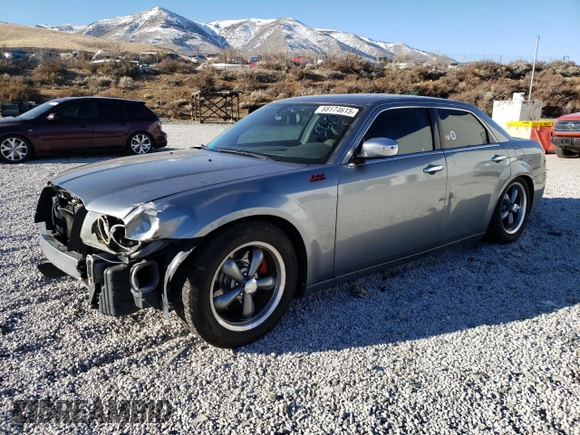 2007 Chrysler 300 C with VIN 2C3LA63H67H706530, listed as a Copart auction lot 88174615 with 104,505 mi miles and Salvage Title. Bid and sale history available at DreamBid. Image 1.